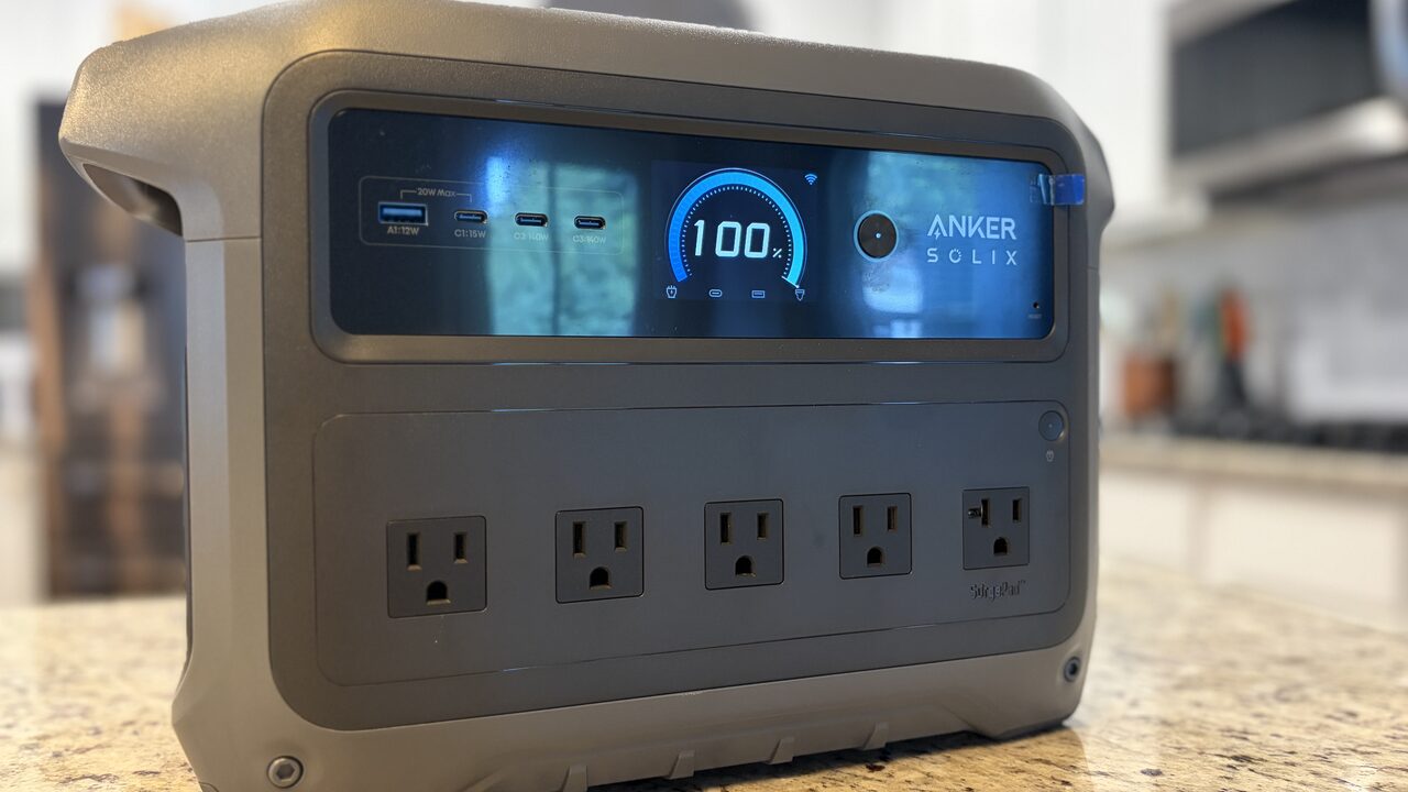 Anker SOLIX C1000 Gen2 Review Anker SOLIX C1000 Gen2 power station on a kitchen counter, display showing 100% charge